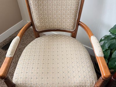 Vintage upholstered wooden armchairs