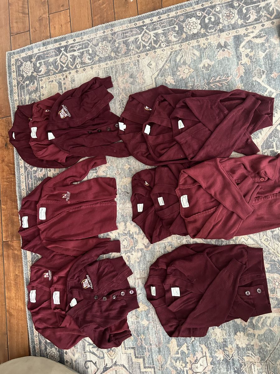 LOTS of girl challenger uniform clothing- skirts, sweaters, pants, and shirts