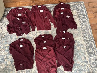 LOTS of girl challenger uniform clothing- skirts, sweaters, pants, and shirts