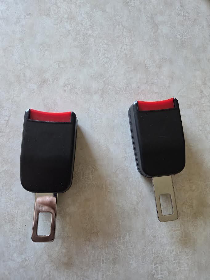 Seat belt extenders
