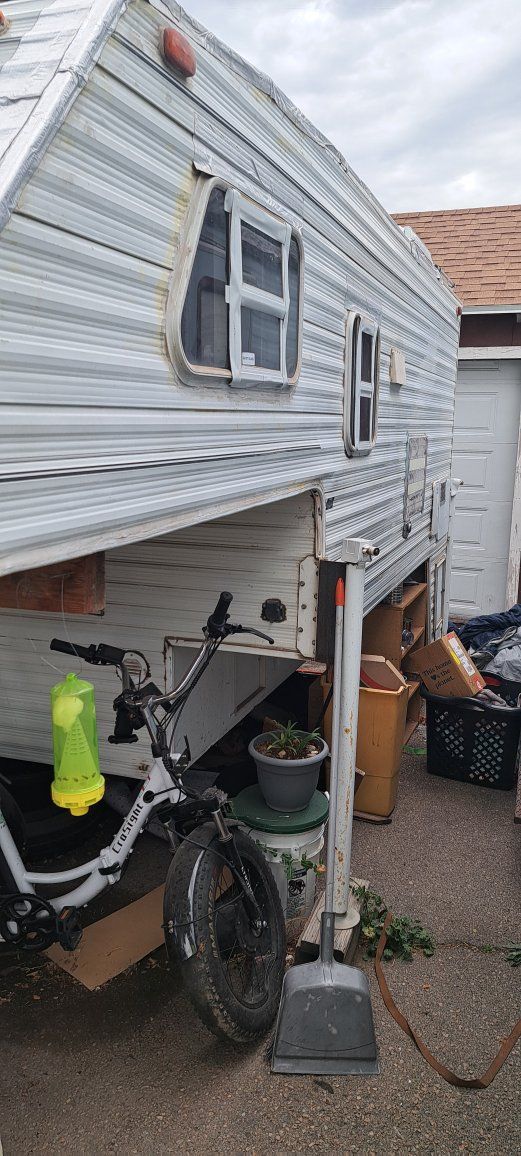 Vintage Truck Camper Unit with Kitchenette and Roof Ladder
