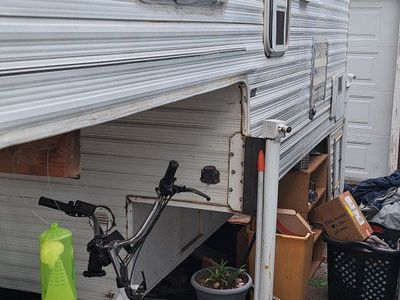 Vintage Truck Camper Unit with Kitchenette and Roof Ladder