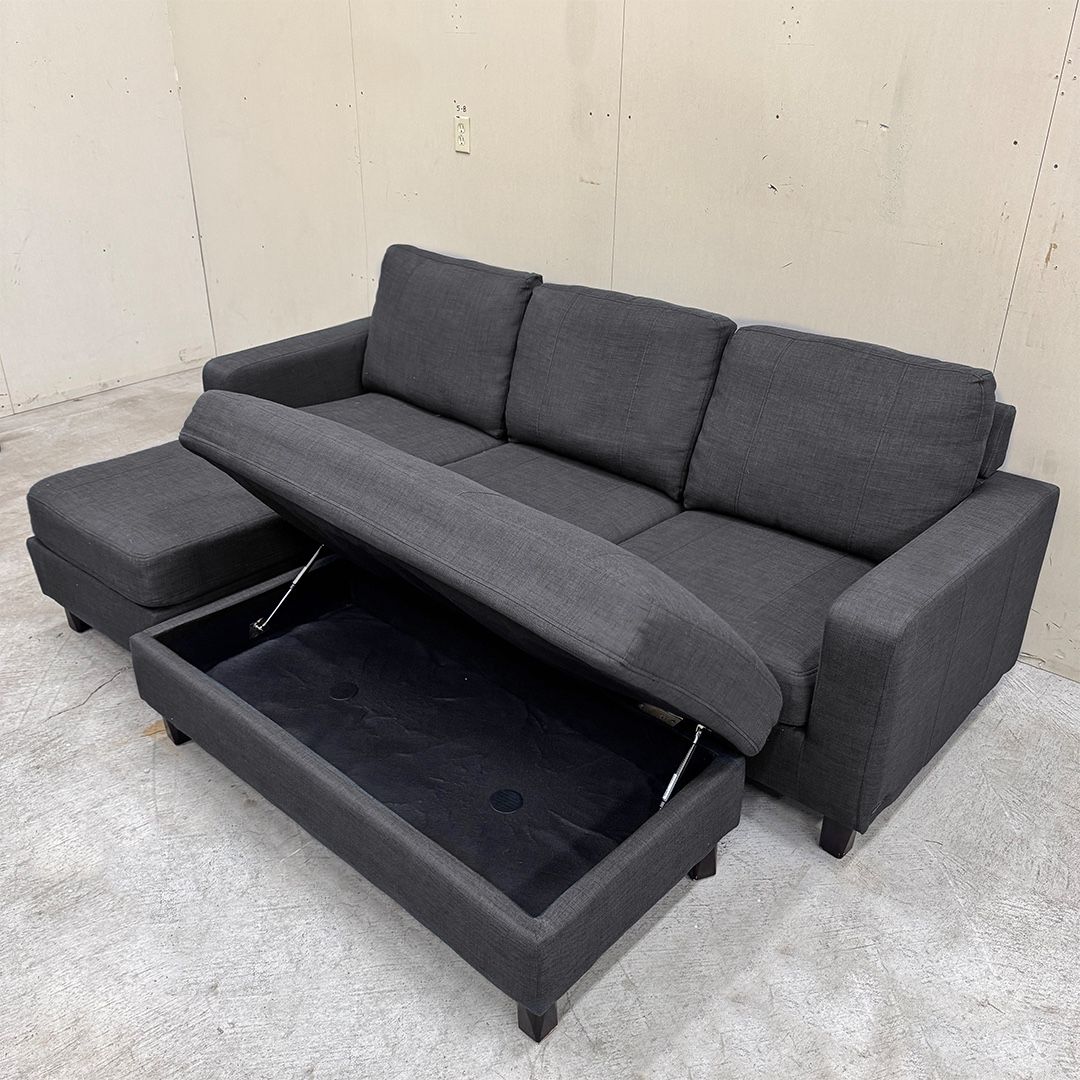 (Reversible) Dark Gray Sectional Couch & Storage Ottoman - Delivery Available