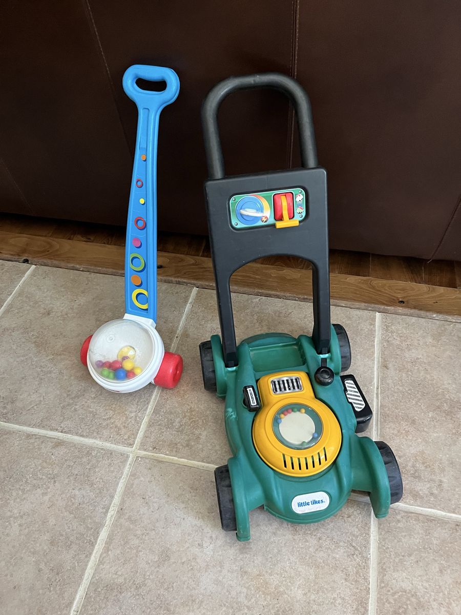 Kids push toys $15.00 each lawnmower and popper