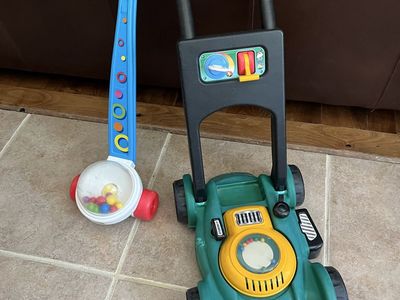 Kids push toys $15.00 each lawnmower and popper