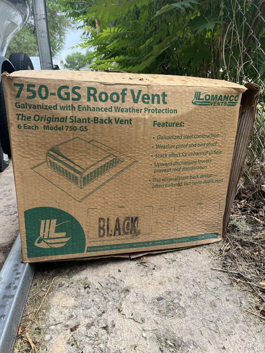 Box of roofing nails and roof vents