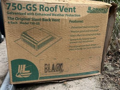 Box of roofing nails and roof vents
