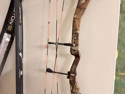 Mach 34, 80lbs, custom ordered with the Evolve Cams. New strings. First lite camo