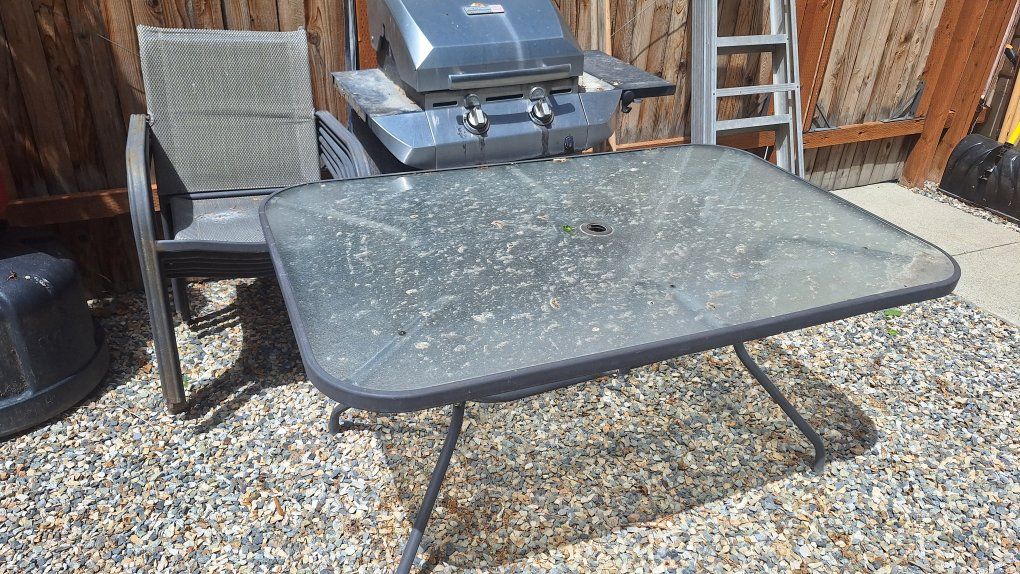 Glass patio table and chairs