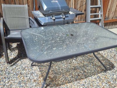 Glass patio table and chairs