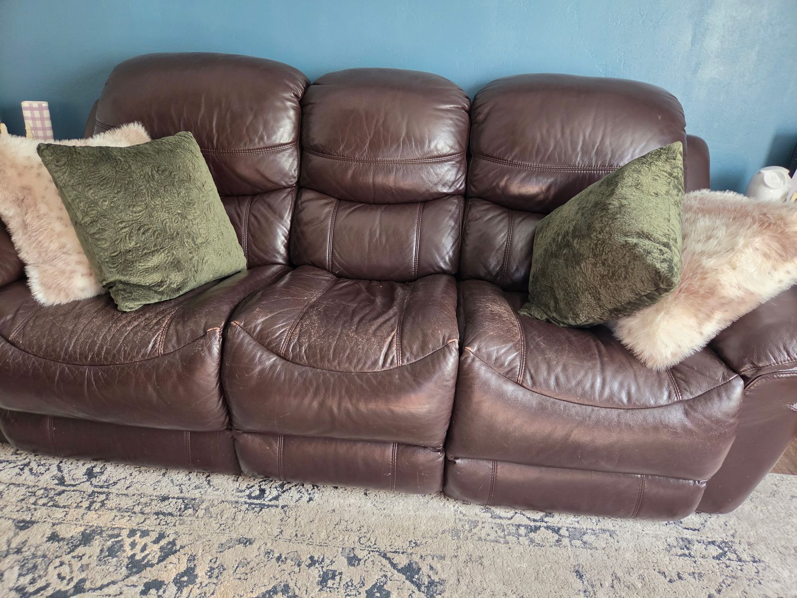 Free Power reclining faux leather sofa