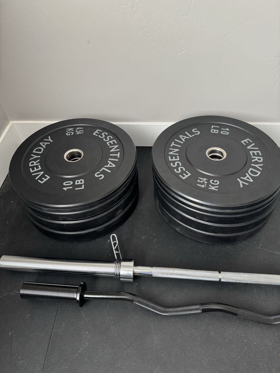 2 inch bumper plates with Olympic barbell and curl bar