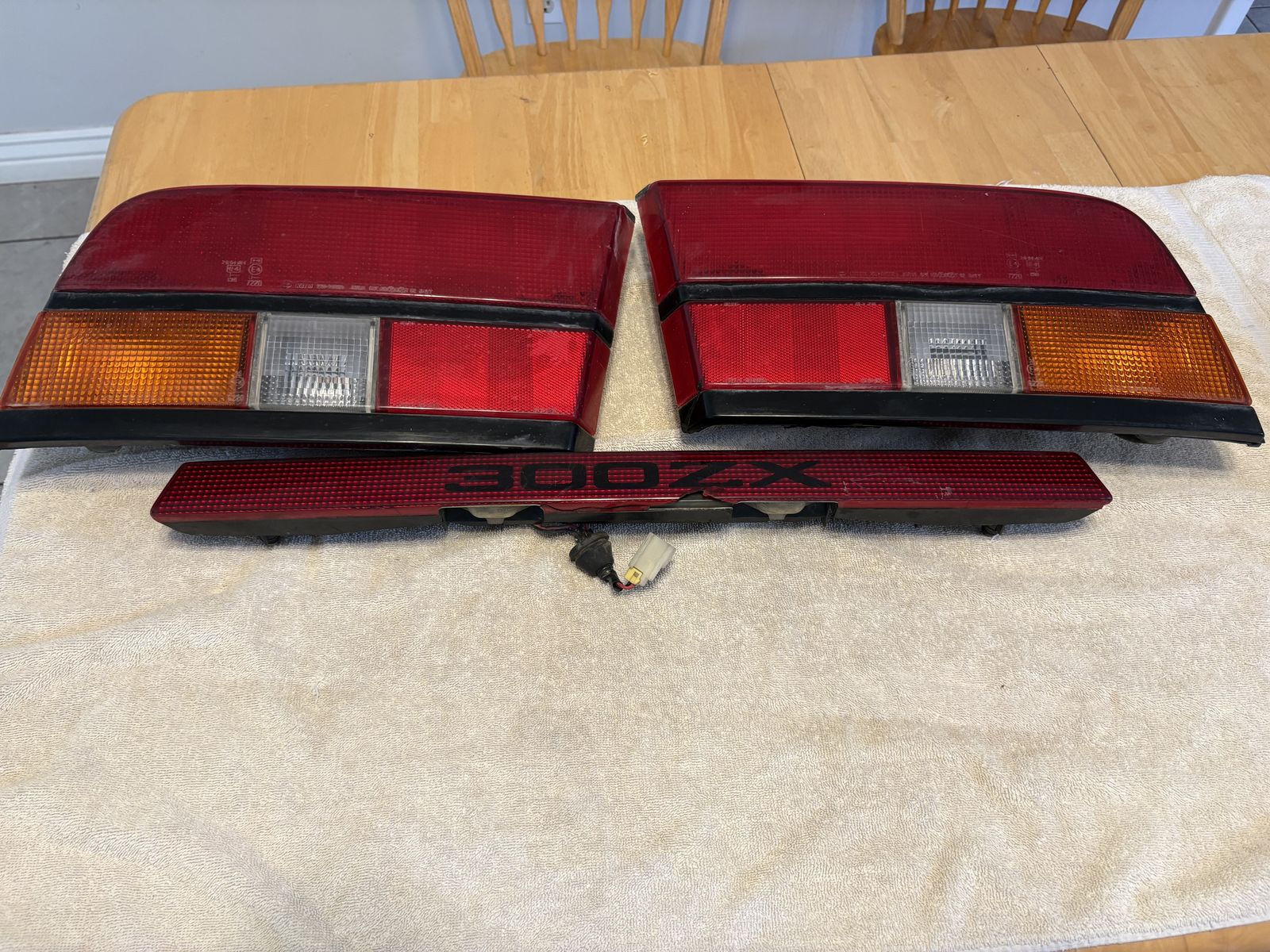 Nissan 300ZX Z31 Taillight Set & Center Garnish - Driver & Passenger Side, Used