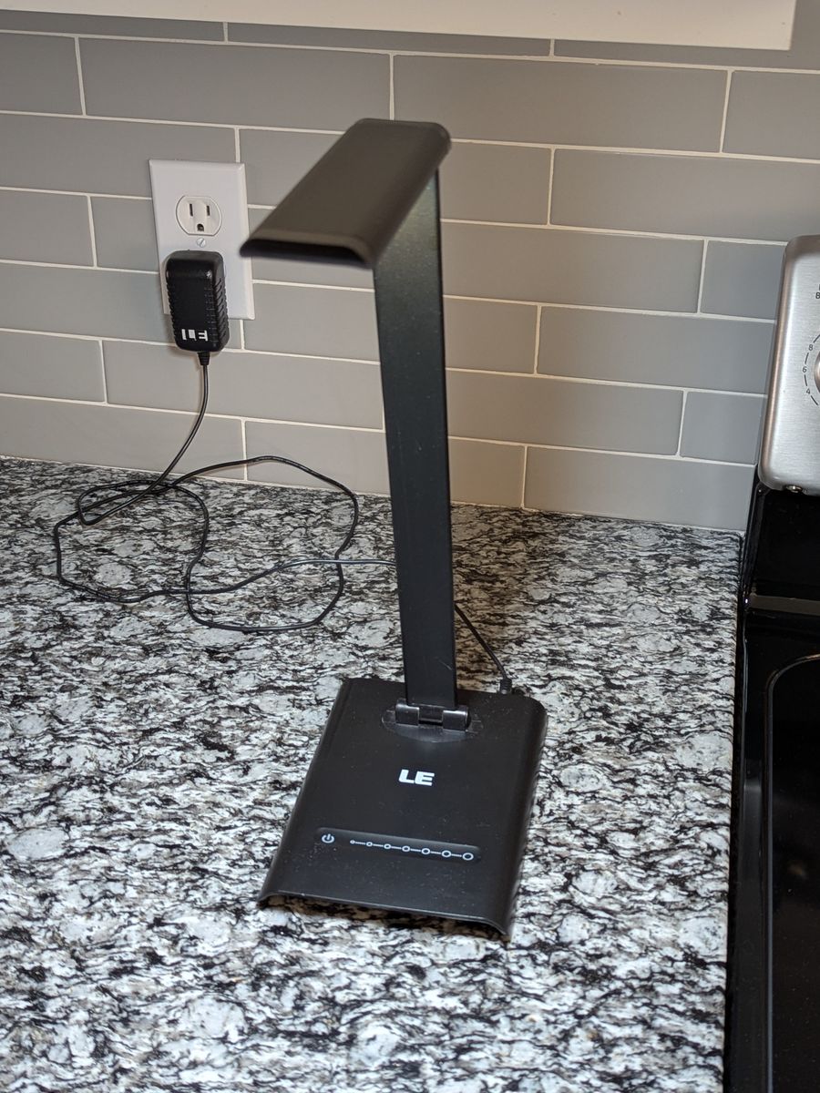 LED touch-sensitive desk lamp with seven brightness levels