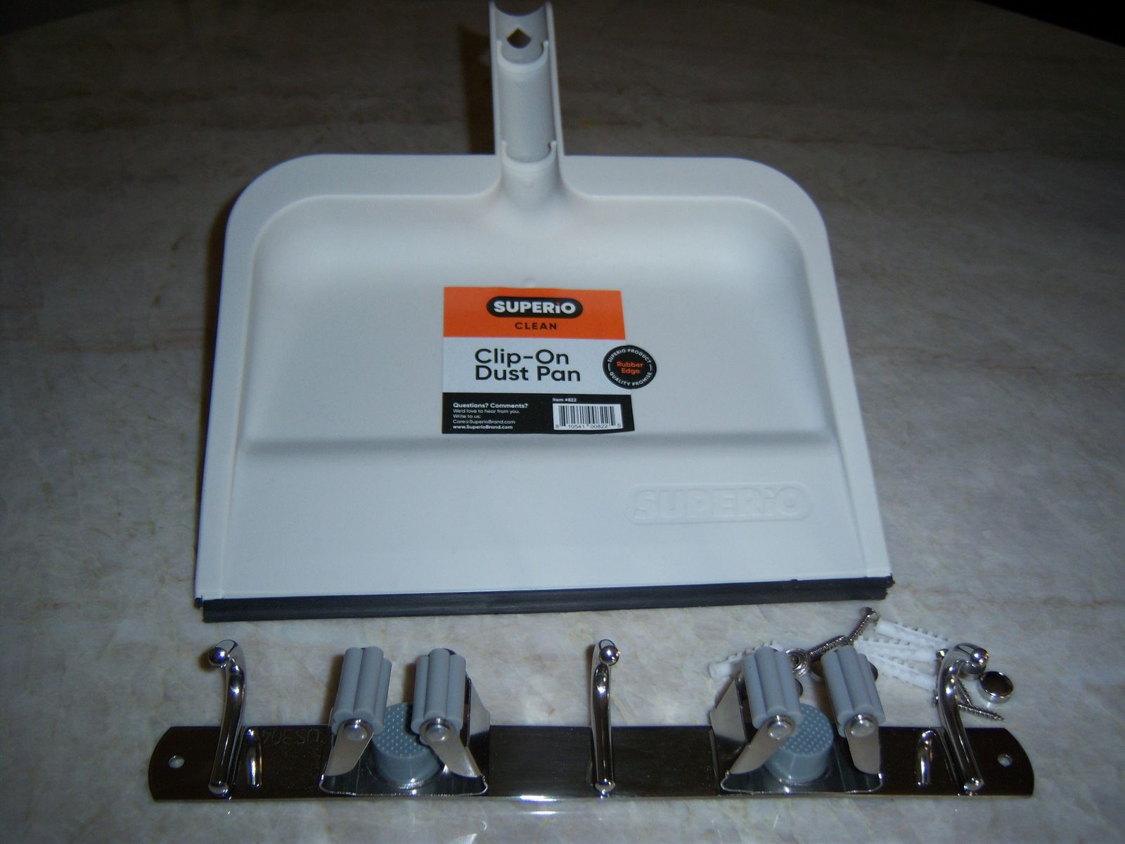 Broom and Mop Holder with 3 Hooks and a Superio Cllip-on Dust Pan with rubber lip.
