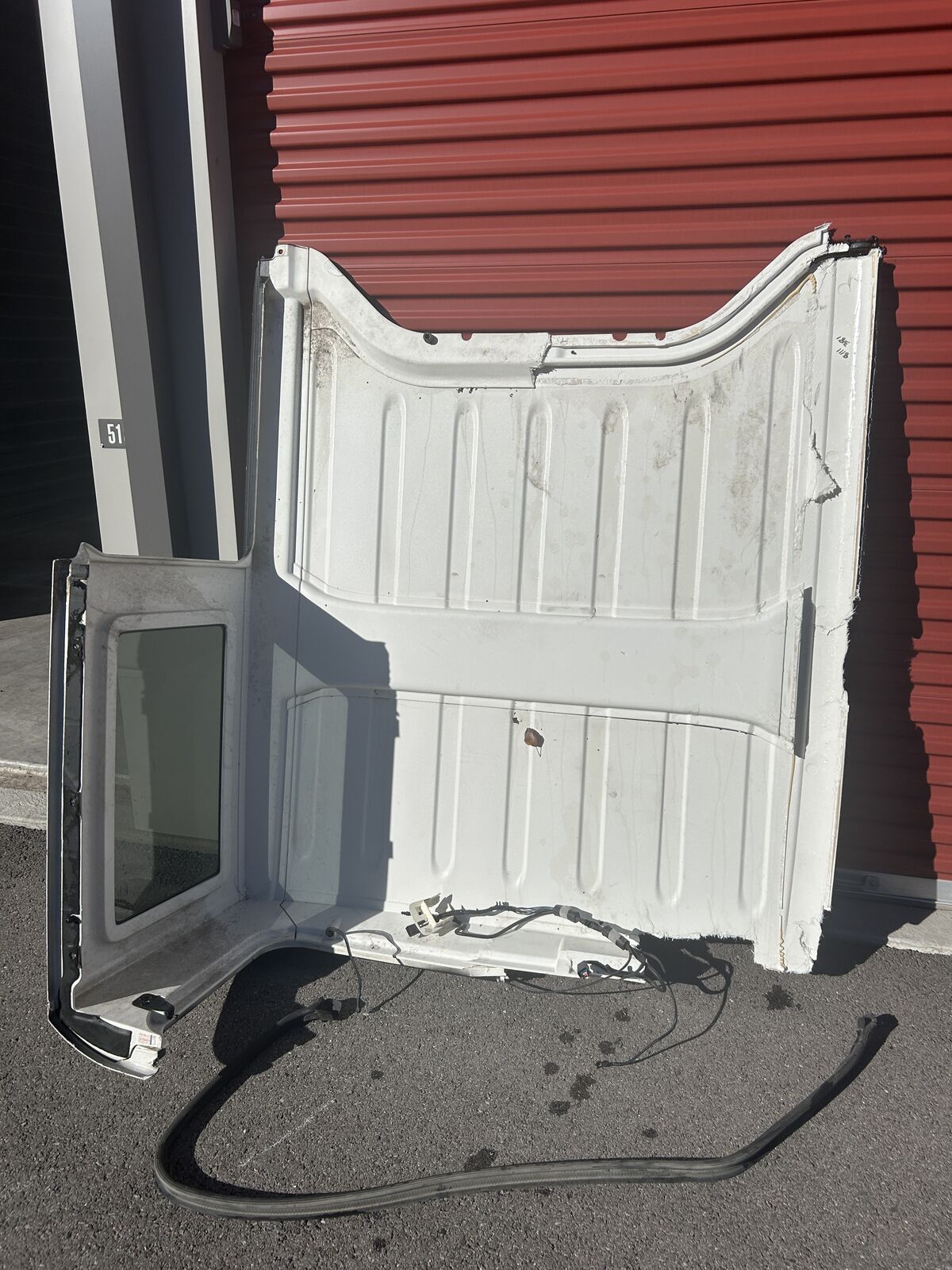 Damaged Jeep Wrangler JKU hard top