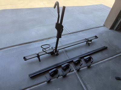 Thule cross bars and single bike rack. Roof mount