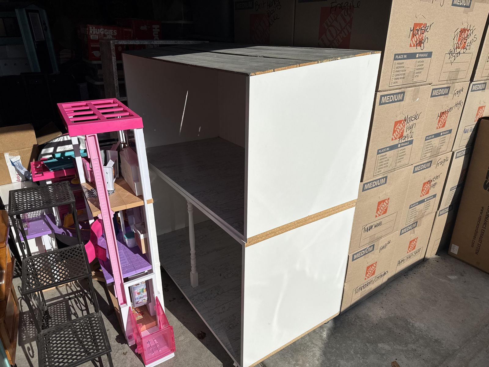 Large doll house and Barbie house