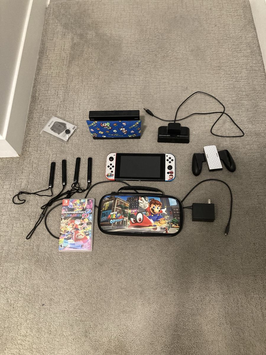 Nintendo Switch with Mario Kart 8 & Accessories