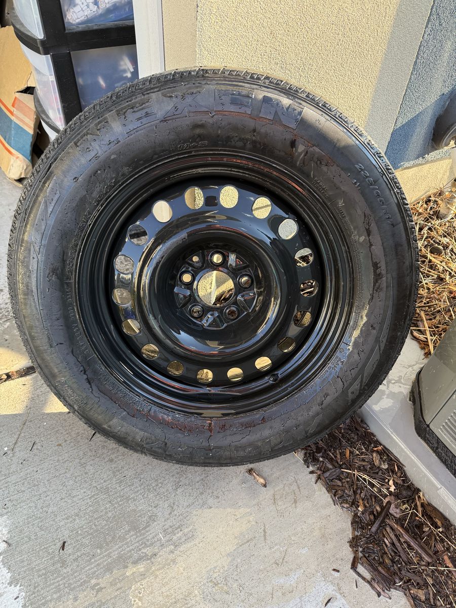 Nexen 235/65R17 Tire Mounted on Black Steel Wheel
