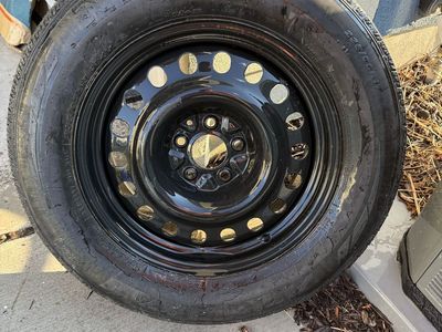 Nexen 235/65R17 Tire Mounted on Black Steel Wheel