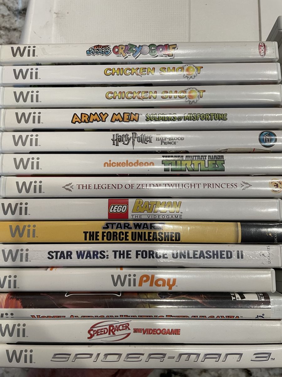 30 Wii games, Nintendo Wii Balance Board & Sports Kit w/ Gun, Ping Pong Paddles, Steering Wheels, Golf Clubs, Joysticks