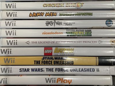 30 Wii games, Nintendo Wii Balance Board & Sports Kit w/ Gun, Ping Pong Paddles, Steering Wheels, Golf Clubs, Joysticks