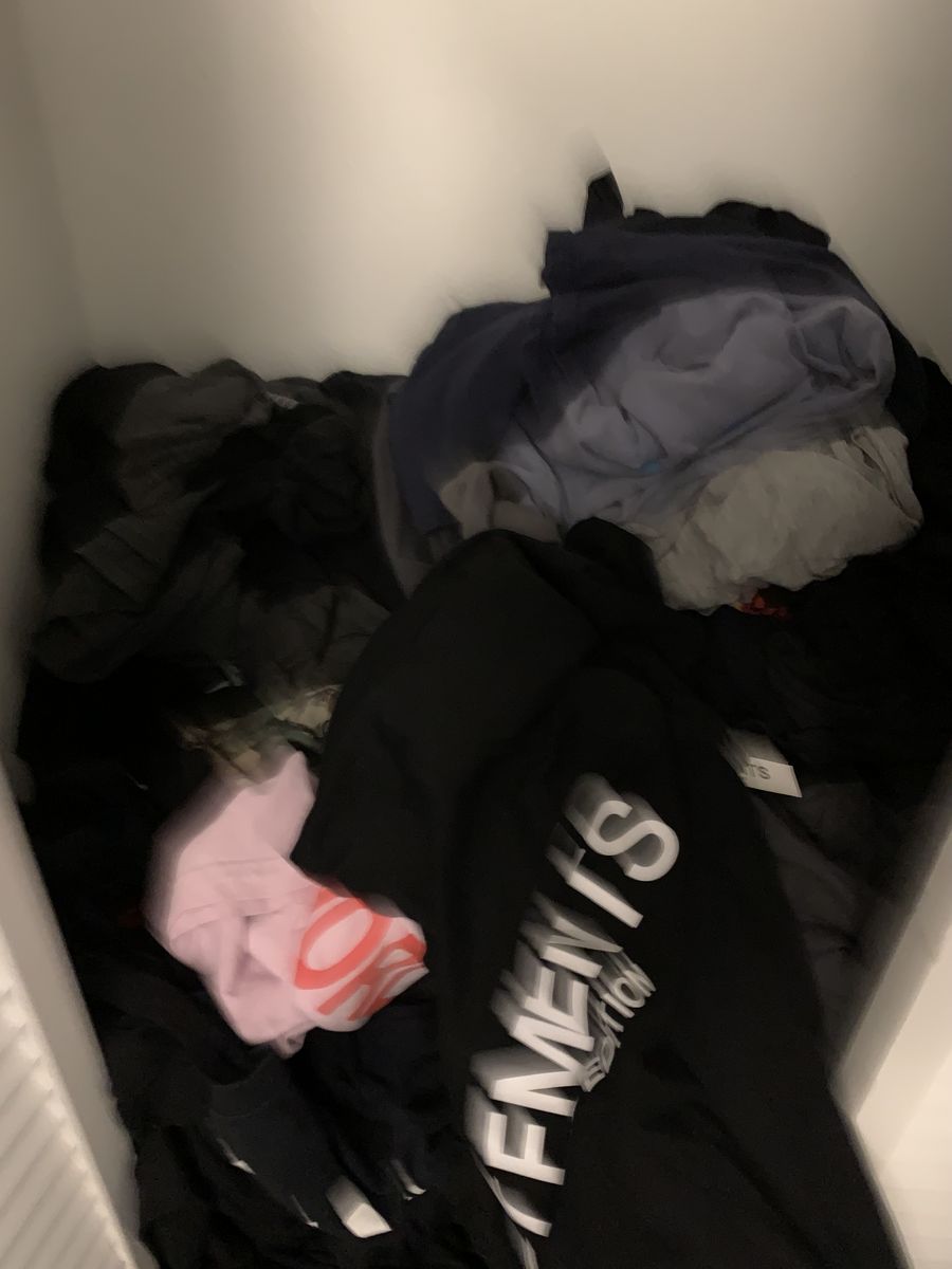Pile of thrifted t shirts