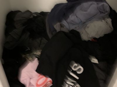 Pile of thrifted t shirts