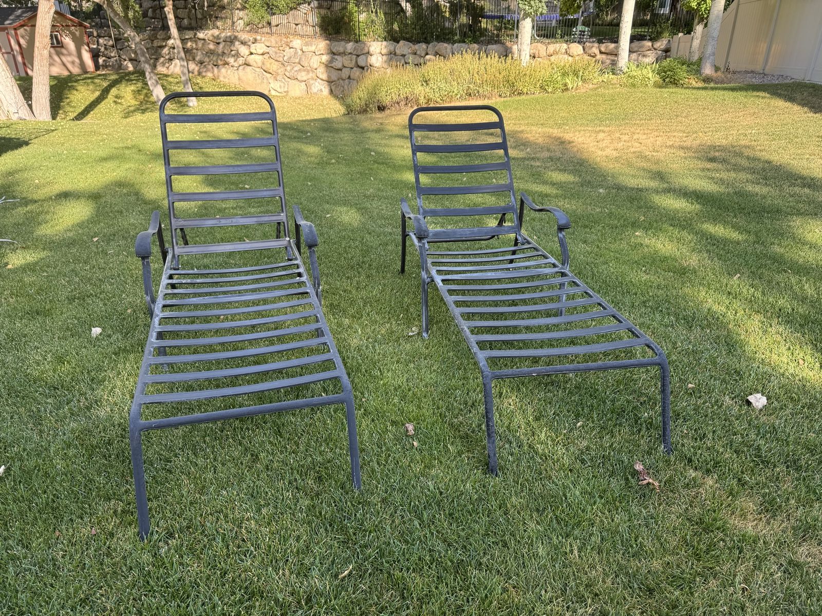 Two matching metal lounge chairs pool chairs adjustable