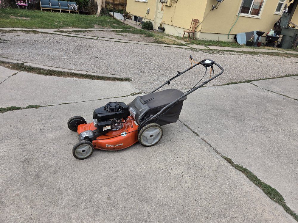 Husqvarna Gas Powered Self-Propelled Lawn Mower with Grass Bagger Attachment
