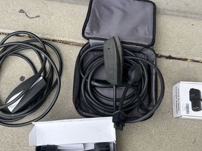Tesla mobile chargers, J1772 adapter, NEMA 14-50, 14-30, and 120v adapters