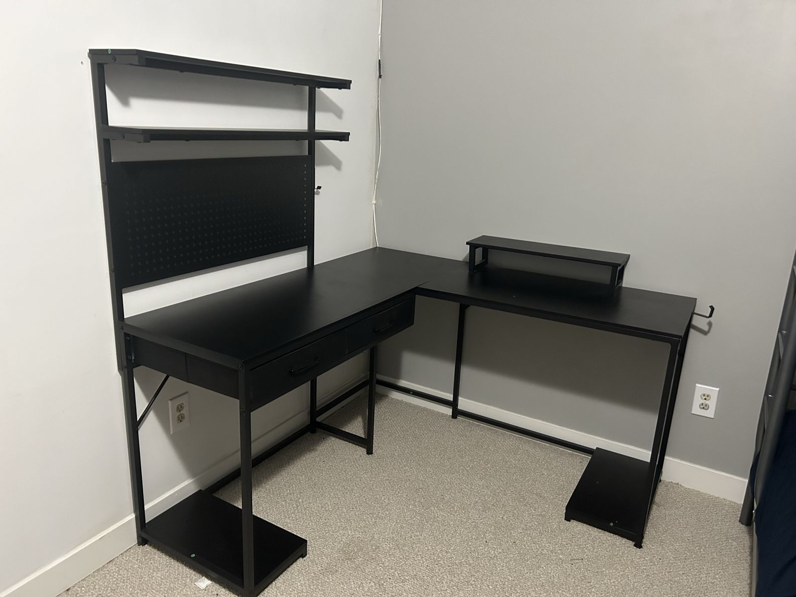 Black L-Shaped Computer Desk with Hutch, Pegboard, and Storage Shelves