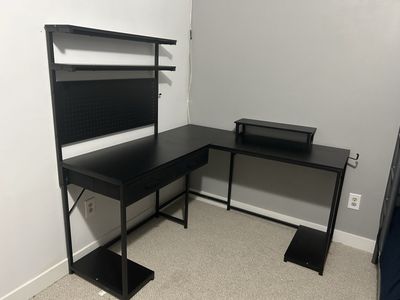Black L-Shaped Computer Desk with Hutch, Pegboard, and Storage Shelves