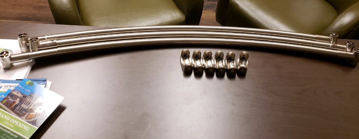 Curved shower rods