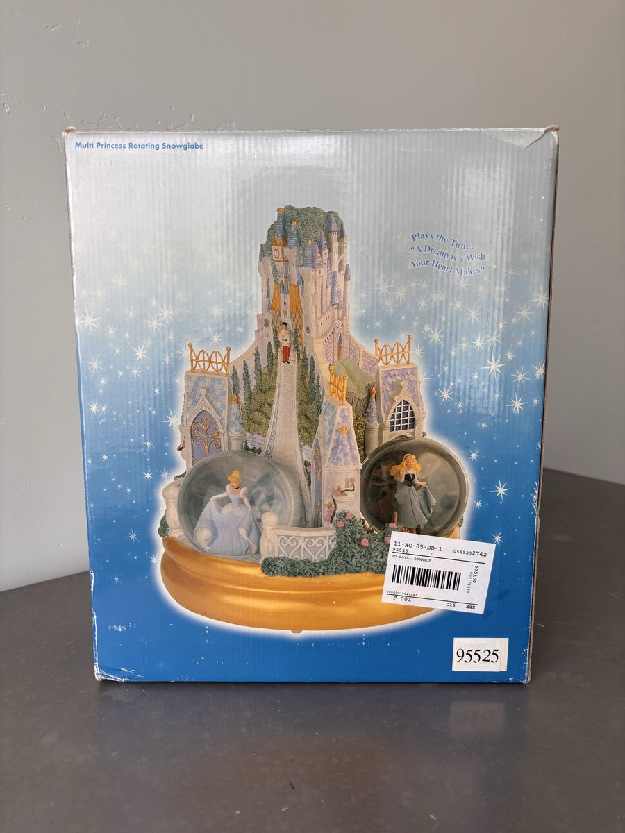 Disney store exclusive multi princess rotating snow globe