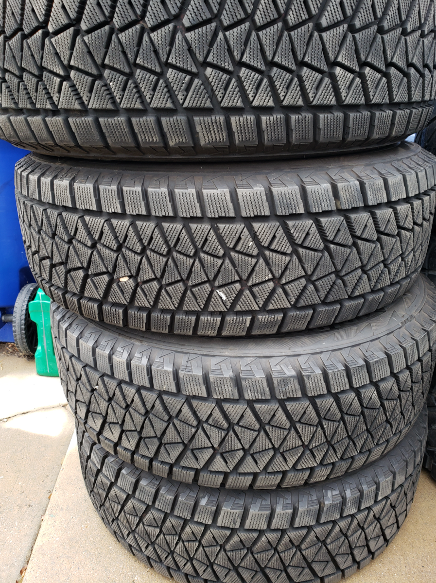 Bridgestone Four 245/17OR17 110S Tires Like new less than 200 miles.