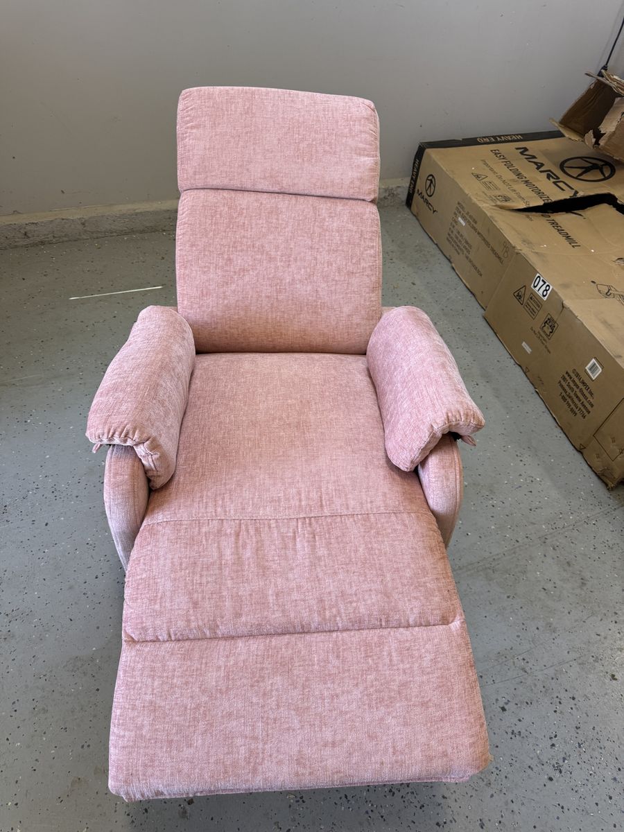 Pink recliner.  Perfect for a girl nursery.