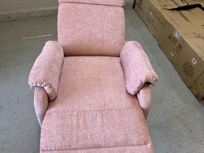 Pink recliner. Perfect for a girl nursery.