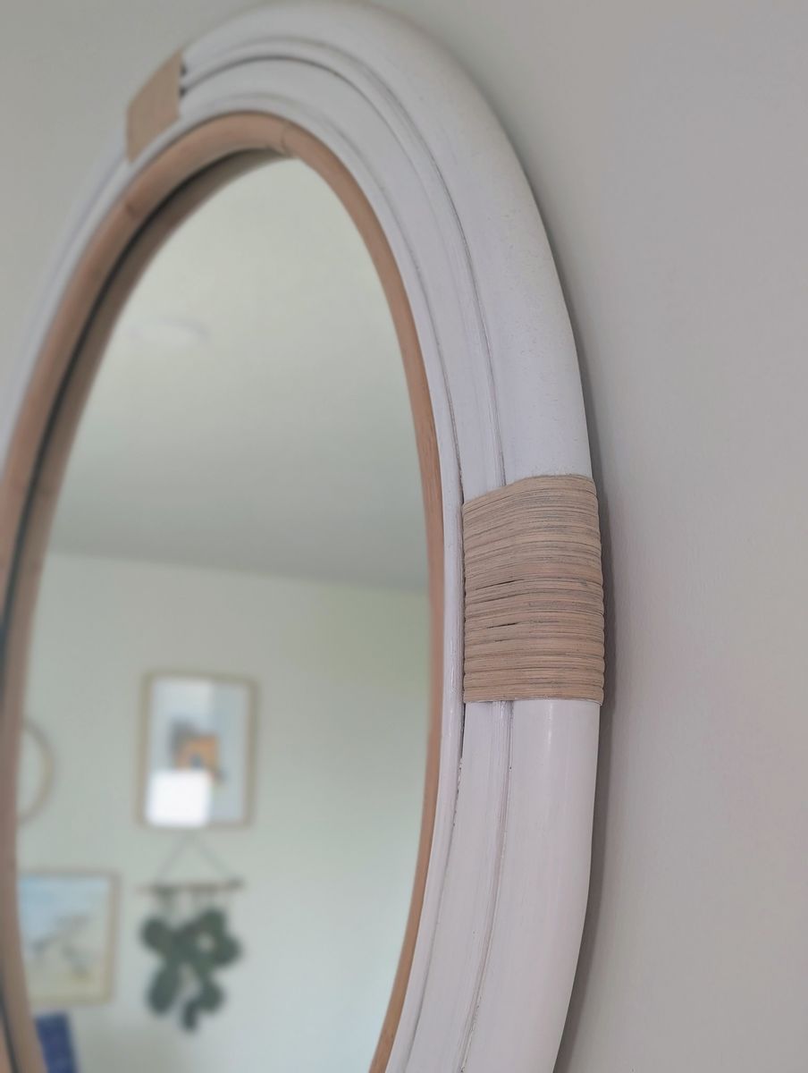 30 inch wall mirror. Beautiful, nautical themed with Rattan frame.
