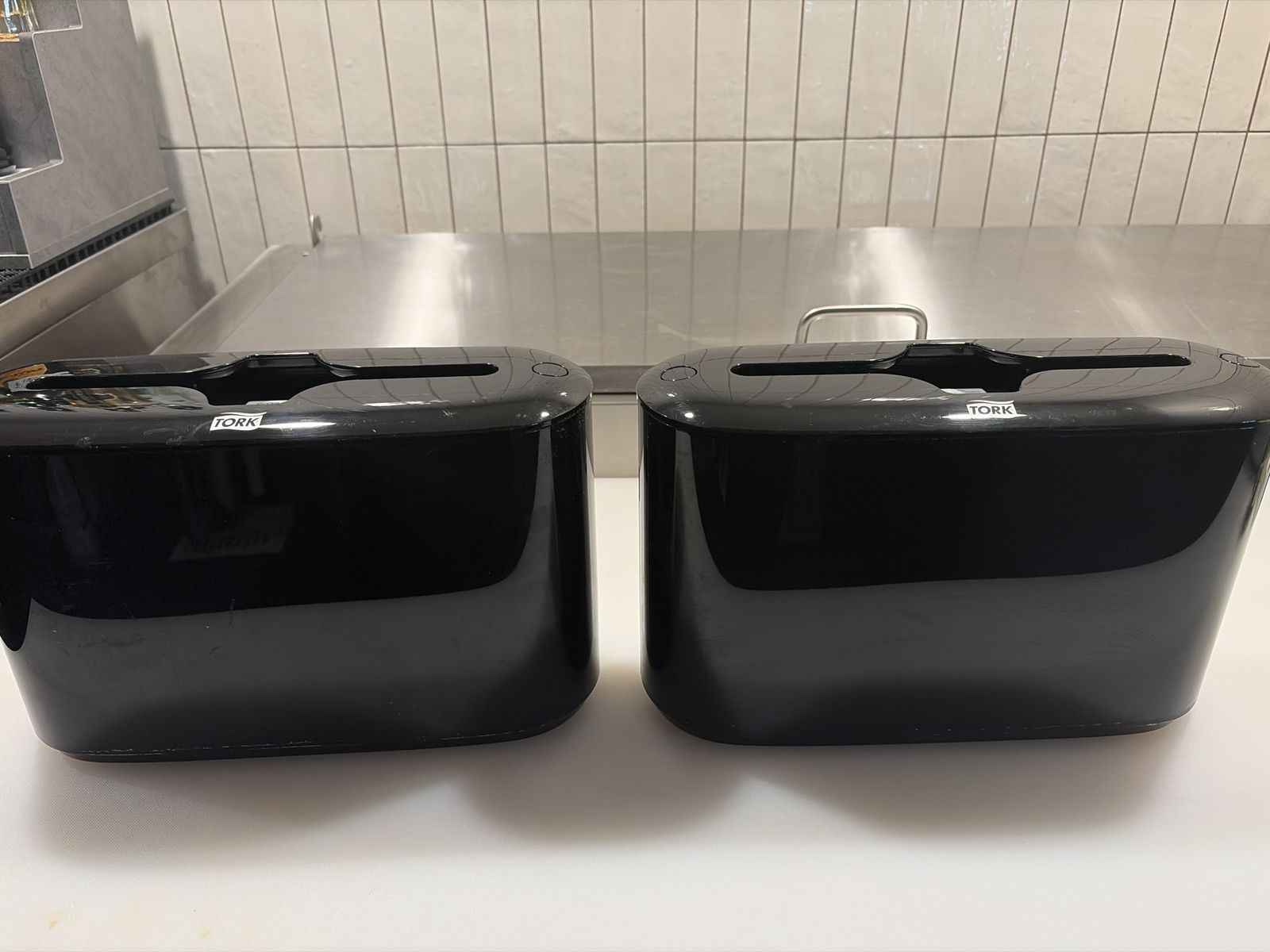Tork H2 Xpress tabletop paper towel dispenser.