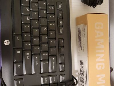 Cooler Master Mouse, HP Keyboard, and CyberPowerPC Mouse Pad