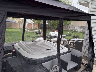 New - Inflatable hot tub + optional surround