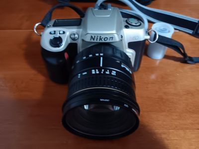 Nikon N60 35mm SLR film camera equipped with a Qua