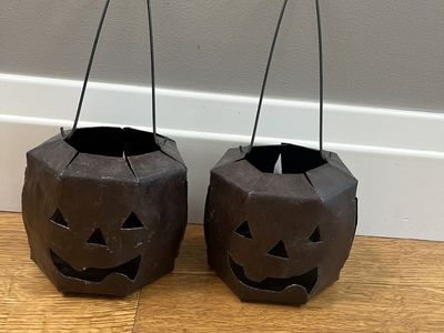 2 wrought iron, Halloween jack-o-lantern votive candle holders. Unique, handmade excellent condition. 4.75” tall