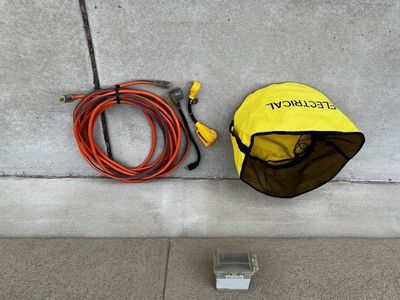 50' 10 AWG extension cord with RV adapters and storage bag