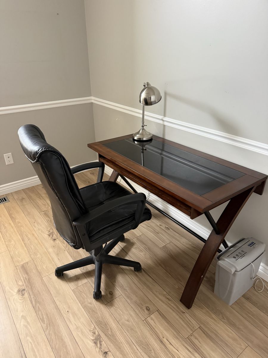 Office desk, chair, and lamp