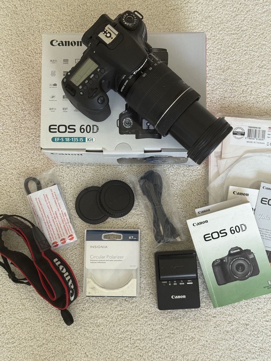 $350 used Canon EOS 60D kit with 18-135 image stabilization lens, extra battery, and Insignia Circular polarizer.