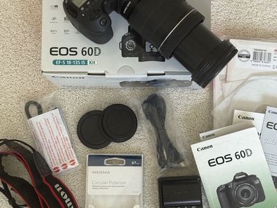 $350 used Canon EOS 60D kit with 18-135 image stabilization lens, extra battery, and Insignia Circular polarizer.