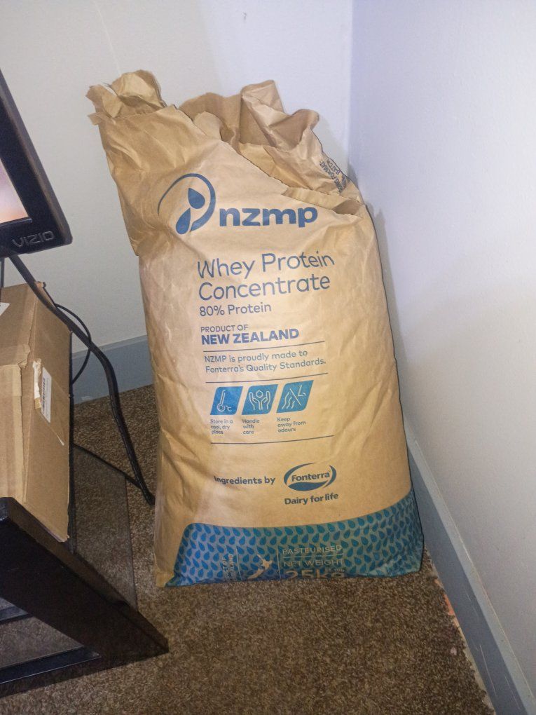 barely opened 55lb bag of protein powder